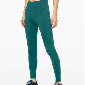 Lululemon teal Fast and Free Tight 28" size 14